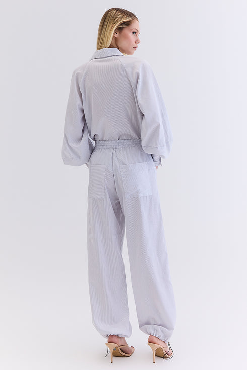 CALÇA LISTRADA OFF COM MARINHO