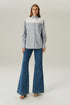 CALCA JEANS FLARE MÉDIO
