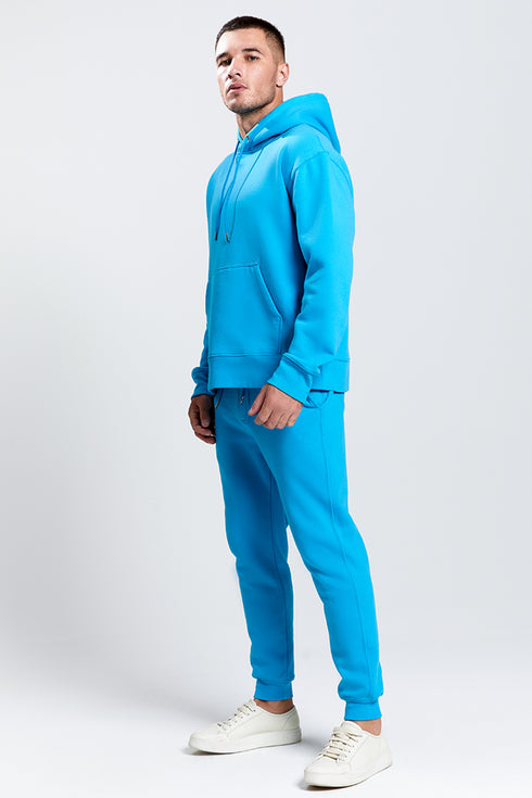 CALÇA C/ PUNHO TURQUESA