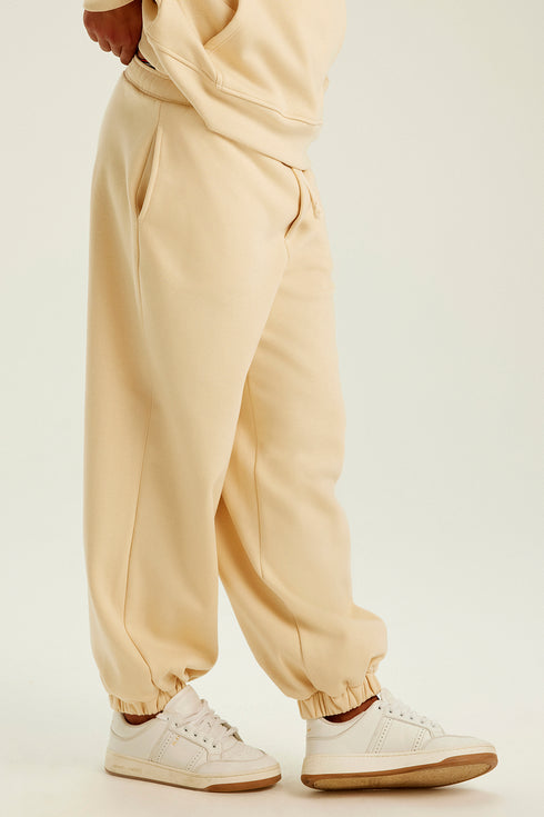 CALÇA TULIPA MANTEIGA