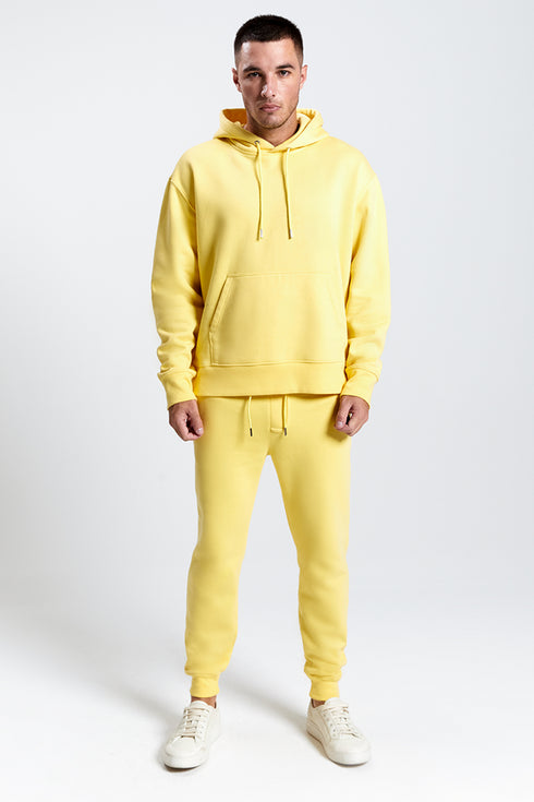 CALÇA C/ PUNHO AMARELO